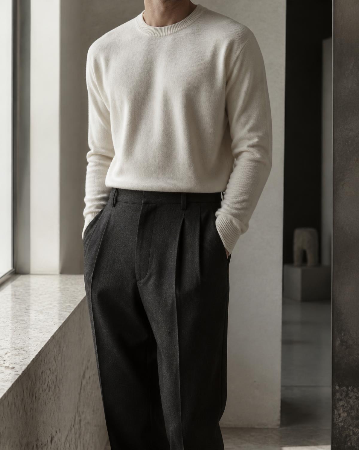 Ivory knit with charcoal pleated trousers